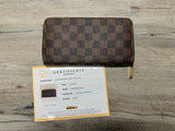 Louis Vuitton Damier Ebene Zippy Wallet, B+ Condition

*Not affiliat