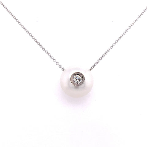 Lady's White 14 Karat Diamond In A Pearl Strand With One 0.08Ct Round