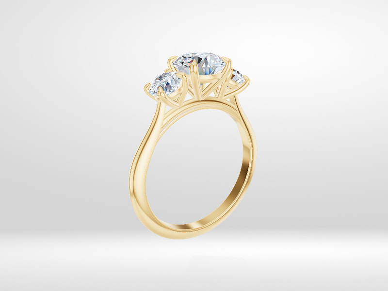 A rendering of a three-stone diamond ring in yellow gold