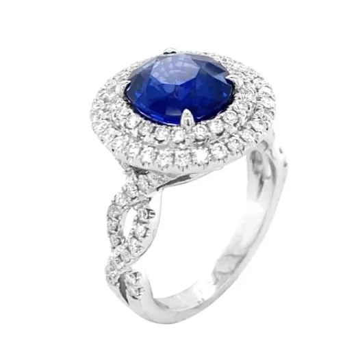 A round sapphire ring in a double halo of diamonds, 18K white gold, from The J. David Legacy Collection