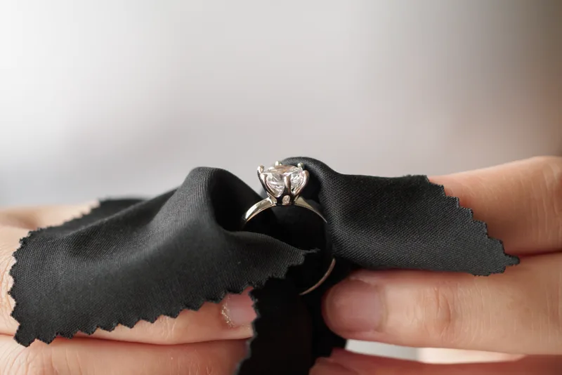 A diamond ring polished in the cleaning cloth