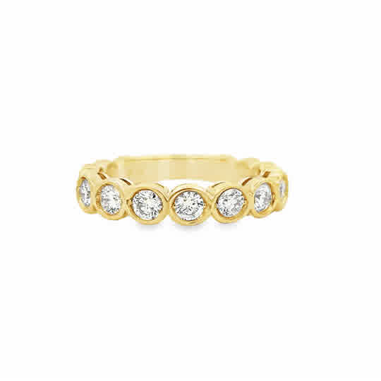 Lady's Yellow 14 Karat Bezel Set Anniversary Ring Size 6.75 7 = 0.69tw Round G/H SI1 Diamonds Weight: 3.9