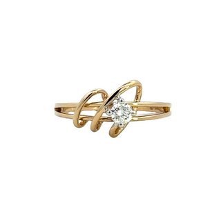 Lady's Yellow 14 Karat Swirl Fashion Ring Size 6.5 one 0.17ct Round G/H SI1 Diamond