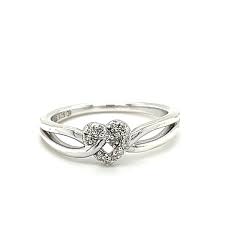 Lady's White Sterling Silver Lovelock Fashion Ring Size 6.5 With 0.07Tw Round G/H Si2 Diamonds