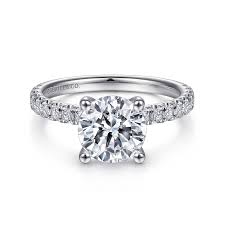 White 14 Karat Prong Set With Hidden Halos Ring one 8.00mm Round Cubic Zirconium
0.47tw Round G/H SI2 Diamonds