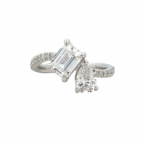 White 14 Karat Modern Two Stone, With Prong Set Sides Ring Size 6.5 With One 7.50X5.50Mm Emerald Cubic Zirconium, One 7.00X5.00Mm Pear Cubic Zirconium And 0.22 Twt Other Stones