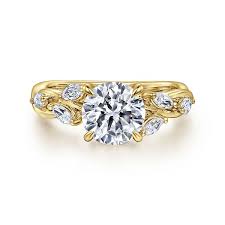 Yellow 14 Karat Floral Ring Size 6.5 one = Round Cubic Zirconium
6 = 0.37tw Round G/H VS2 Diamonds