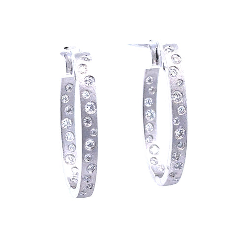 Lady's White 14 Karat Oval, Flush Set Hoop Earrings With 0.63Tw Round G/H Si1 Diamonds