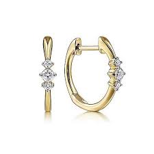 Lady's Yellow 14 Karat Three Stations, Huggie Hoop Earrings With = 0.10Tw Round I/J Si1 Diamonds