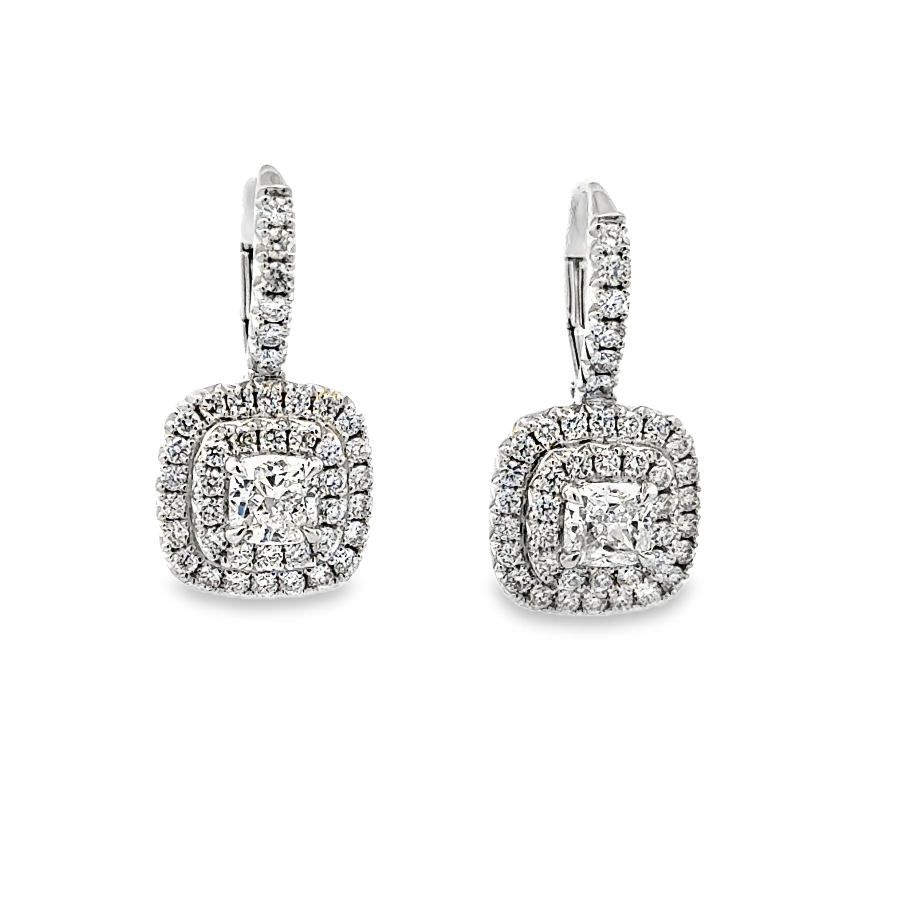 Lady's White 18 Karat Halo Dangle Earrings With 2 = 1.06Tw Cushion G/H Si1 Diamonds And 84 = 0.84Tw Round G/H Si1 Diamonds