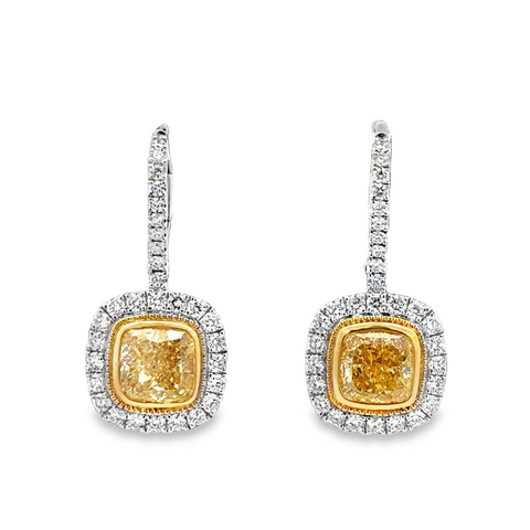Lady's White/Yellow 18 Karat Halo Dangle Earrings one = 1.33ct Cushion VS1 Yellow Diamond
one = 1.38ct Cushion VVS2 Yellow Diamond
60 = 0.62tw Round G/H VS2 Diamonds