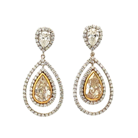 Lady's White/Yellow 18 Karat Double Pear Dangle Earrings 158 = 0.95tw Round G/H SI1 Diamonds
2 = 2.86tw Pear Yellow Diamonds
2 = 0.65tw Pear G/H SI1 Diamonds