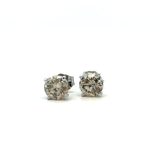 Lady's White 14 Karat Four Prong Studs Earrings With 2 1.50Tw Round J/K I2 Diamonds.