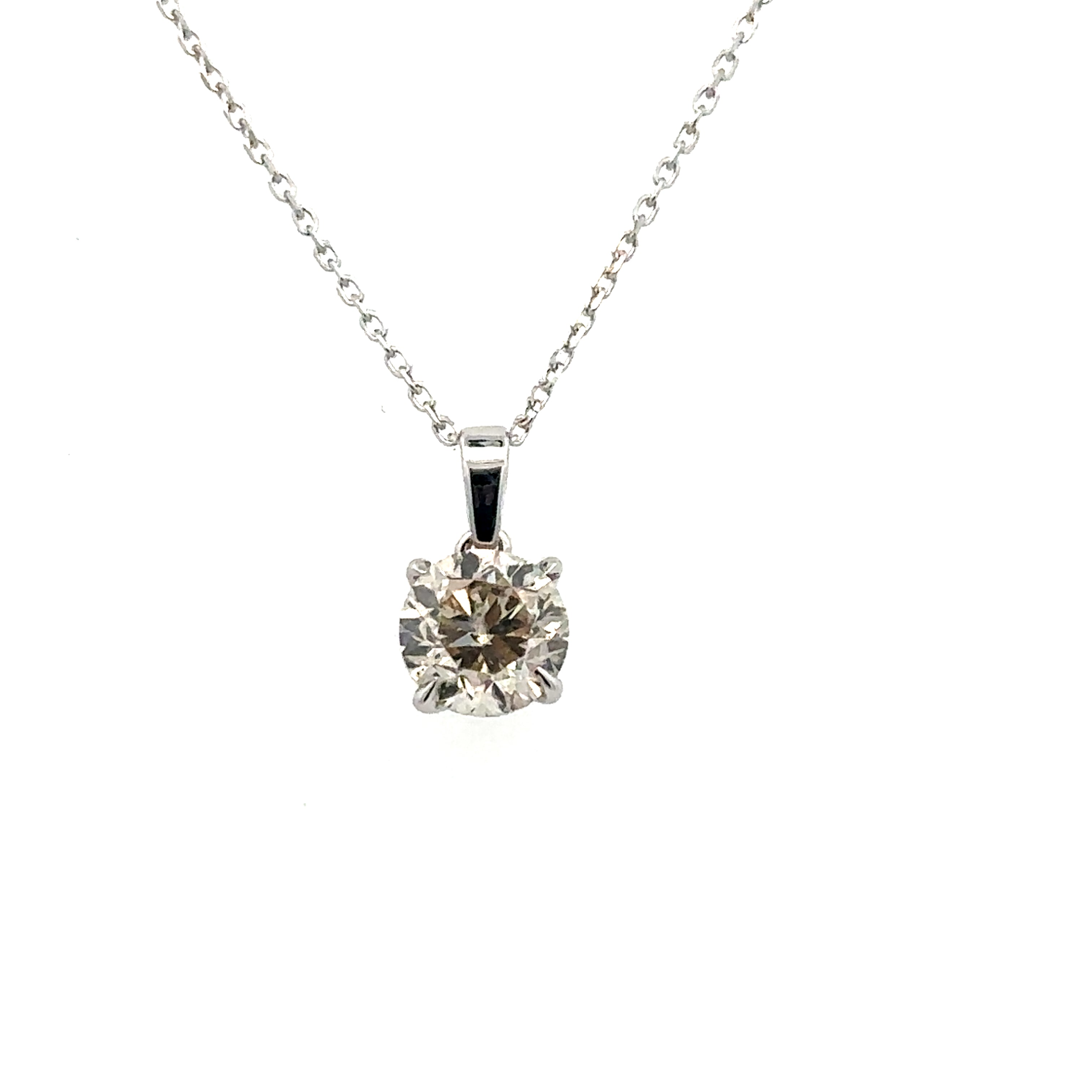 White 14 Karat Solitaire Style Pendant Length 18 With One = 1.00Ct Round J/K I2 Diamond Regularly $5,999, Valentine's Special $2,499 While Supplies Last. Cannot be combined with any other offer or discount.