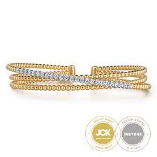 Tt 14 Karat Bujukan Collection, Criss Cross Bangle Bracelet Length 6.25 With = 0.37Tw Round G/H Si2 Diamonds