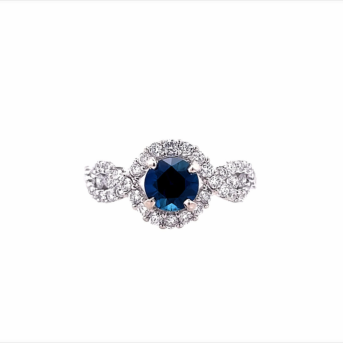 Lady's White 14 Karat Twist With Round Halo Fashion Ring Size 6.5 With One 0.85Ct Round Sapphire And 0.60Tw Round H/I Si2 Diamonds