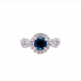 Lady's White 14 Karat Twist With Round Halo Fashion Ring Size 6.5 With One 0.85Ct Round Sapphire And 0.60Tw Round H/I Si2 Diamonds