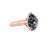 Lady's Rose 14 Karat Modern Halo Fashion Ring one 8.00ct Various Shapes Rutilated Quartz
0.18tw Round H/I SI1 Diamonds