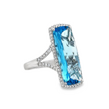 Lady's White 14 Karat Elongated Halo With Split Shank Fashion Fashion Ring Size 7 With One 9.25Ct Retangular Cushion Blue Topaz And 0.4Tw Round G/H Si1 Diamonds