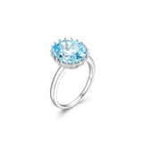 Lady's White Sterling Silver Oval Fashion Ring one = Oval Blue Topaz