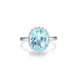 Lady's White Sterling Silver Oval Fashion Ring one = Oval Blue Topaz