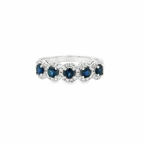 Lady's White 14 Karat Halo Stations Fashion Ring Size 7 5 = 0.71tw Round Sapphires
= 0.32tw Round G/H SI2 Single Cut Diamonds