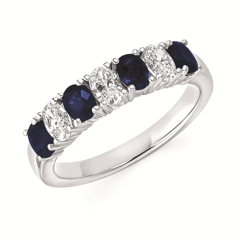 Lady's White 14 Karat Seven Stone Fashion Ring Size 6.5 4 = 1.00tw Oval Sapphires
3 = 0.48tw Oval Diamonds
