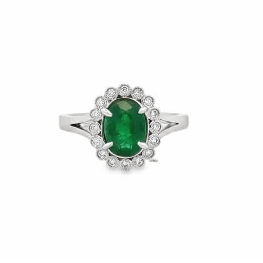Lady's White 14 Karat Halo With Milgrain Bezels Fashion Ring Size 7 one = 1.28ct Oval Emerald
= 0.16tw Round G/H SI1 Diamonds