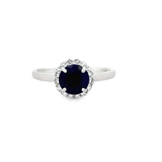 Lady's White Sterling Silver Round Halo Fashion Fashion Ring Size 6.5 one = 7.00mm Round Sapphire, Dyed
= Round White Topazs