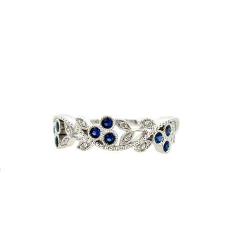 Lady's White 14 Karat Floral Vine Fashion Ring 9 = 0.23tw Round Sapphires
= 0.06tw Round G/H SI1 Diamonds