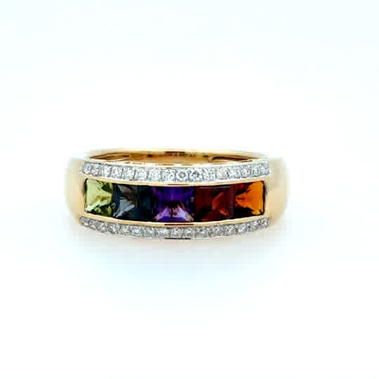 Lady's Yellow 14 Karat Channel Set, Graduating Fashion Ring 5 = 1.95tw Princess Multi Stones
= 0.16tw Round G/H SI1 Diamonds