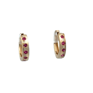 Lady's Yellow 14 Karat Satin Offset Huggie Hoops 13.5Mm Earrings With 0.22Tw Round Rubys And 0.04Tw Round Diamonds