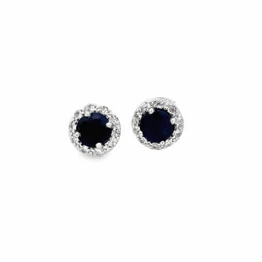Lady's White Sterling Silver Rhodium Plated Round Halo Stud Earrings 2 = 5.00mm Round Sapphires, Dyed 
= Round White Topazs