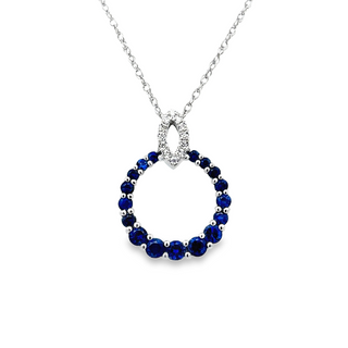 Lady's White 14 Karat Graduating Circle Necklace Length 18 With 12 = 0.10Tw Round G/H Si1 Diamonds And 17 = 1.41Tw Round Sapphires