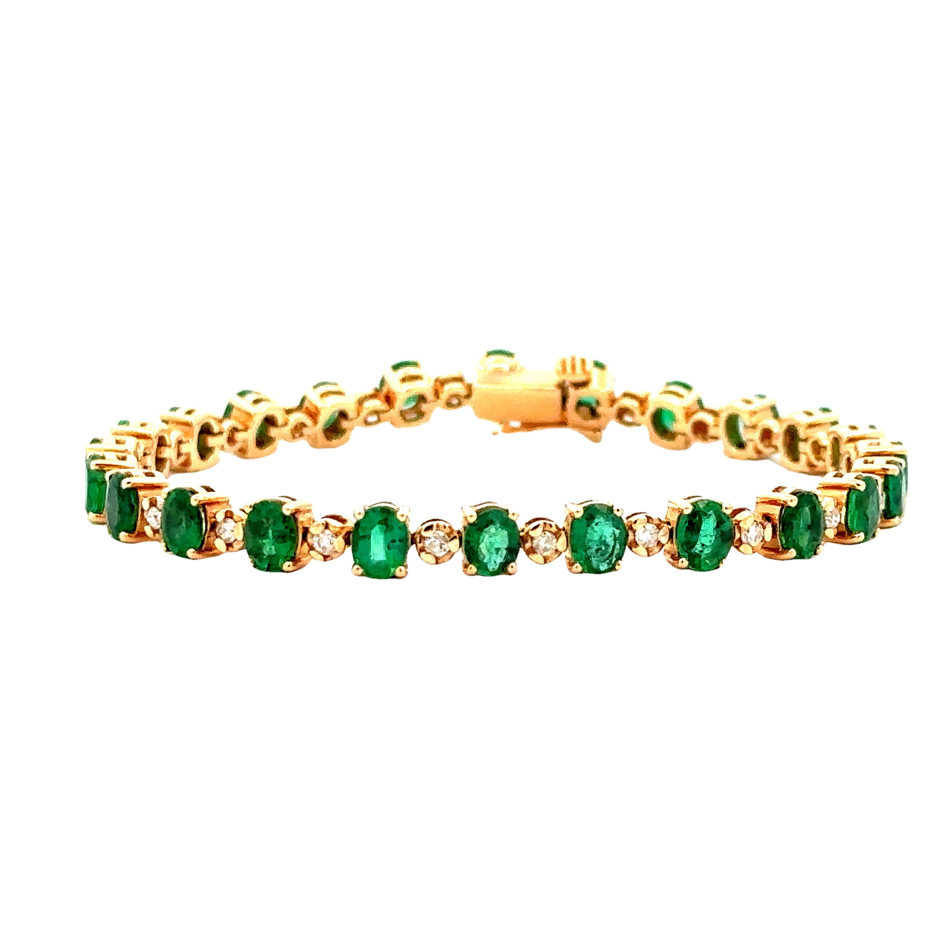 Lady's Yellow 14 Karat Oval And Round Link Bracelet With 24=7.25Tw Oval Emeralds And 24=0.50Tw Round H/I Si2 Diamonds