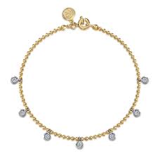 Lady's Yellow 14 Karat Bezel Dangle Droplets Bracelet Length 7 With = 0.38Tw Round White Sapphires