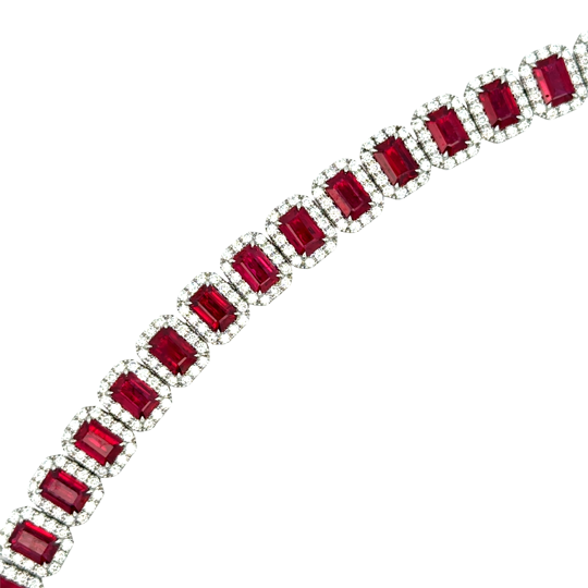 Lady's White 18 Karat Halo Bracelet Length 7 24 = 14.25tw Emerald Rubys
336 = 4.09tw Round G/H SI1 Diamonds