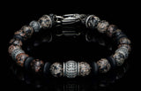William Henry Beaded Bracelet features three custom sterling silver beads, sterling end caps, and lobster clasp.