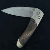 William Henry "A300-6" Knife with S35VN Stainless Steel Blade and Hand Finished Aerospace Grade Titanium Frame with Inlaid 'Copper Swirl' Carbon Fiber.