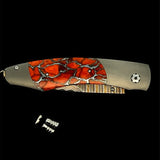 The Spearpoint ‘Laguna’ William Henry Knife with Aerospace Grade Titanium and Apple Coral Inlaid Frame, with 'Copper Wave' Damascus Steel Blade with VG-5 Core.
