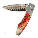 The Spearpoint ‘Laguna’ William Henry Knife with Aerospace Grade Titanium and Apple Coral Inlaid Frame, with 'Copper Wave' Damascus Steel Blade with VG-5 Core.