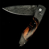 William Henry Knife The Spearpoint 'Epic Night' with 'Hornets Nest' Damascus Steel Blade and Hand Forged, Etched 'Twist' Damascus Frame with Ring Cut Fossil Woolly Mammoth Tusk Inlay.