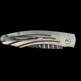 'Golden Arch' William Henry Knife with Hand Forged 'Wave' Damascus Blade with VG-10 Core and Blast-Finished Aerospace Grade Titanium Frame with Anodized Gold Accents.