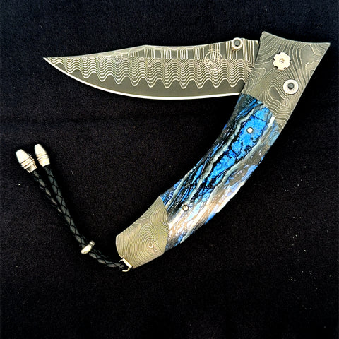 "B21 Blue Wave" William Henry Knife with Hand-Forged 'Twist' Damascus Steel and Woolly Mammoth Tooth Fossil Frame and 'Wave' Damascus Steel Blade.