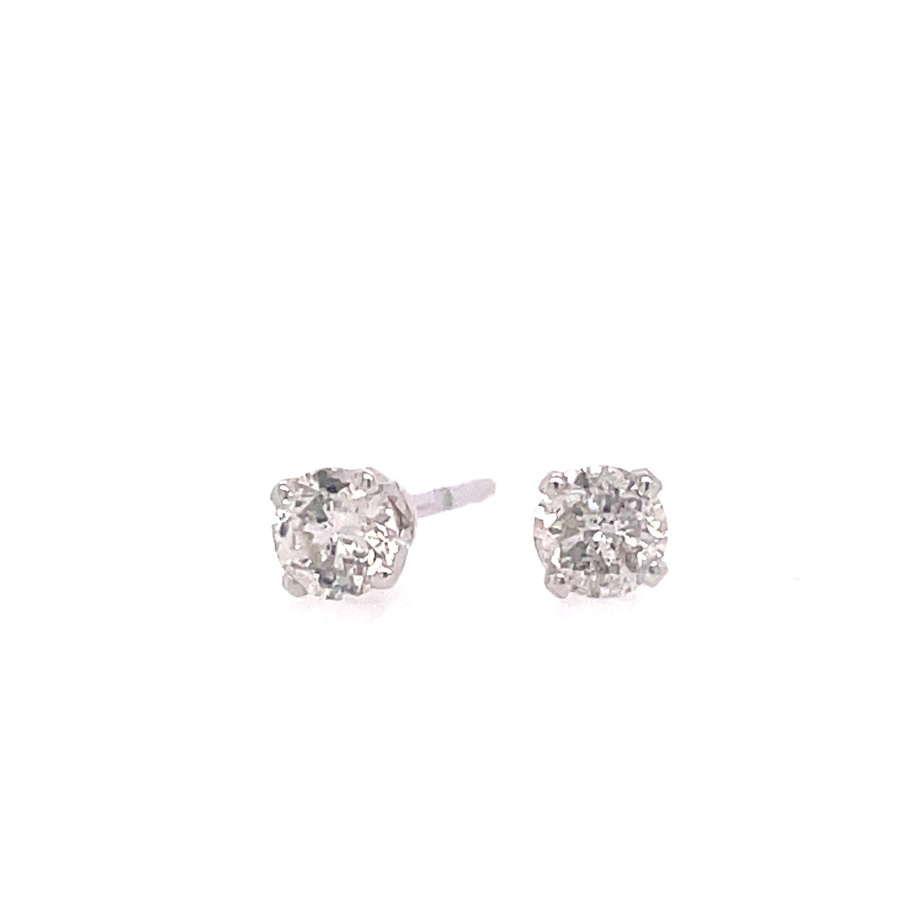 Lady's White Polished 14 Karat Four Prong Stud Earrings With 2=0.30Tw Round J/K I1 Diamonds