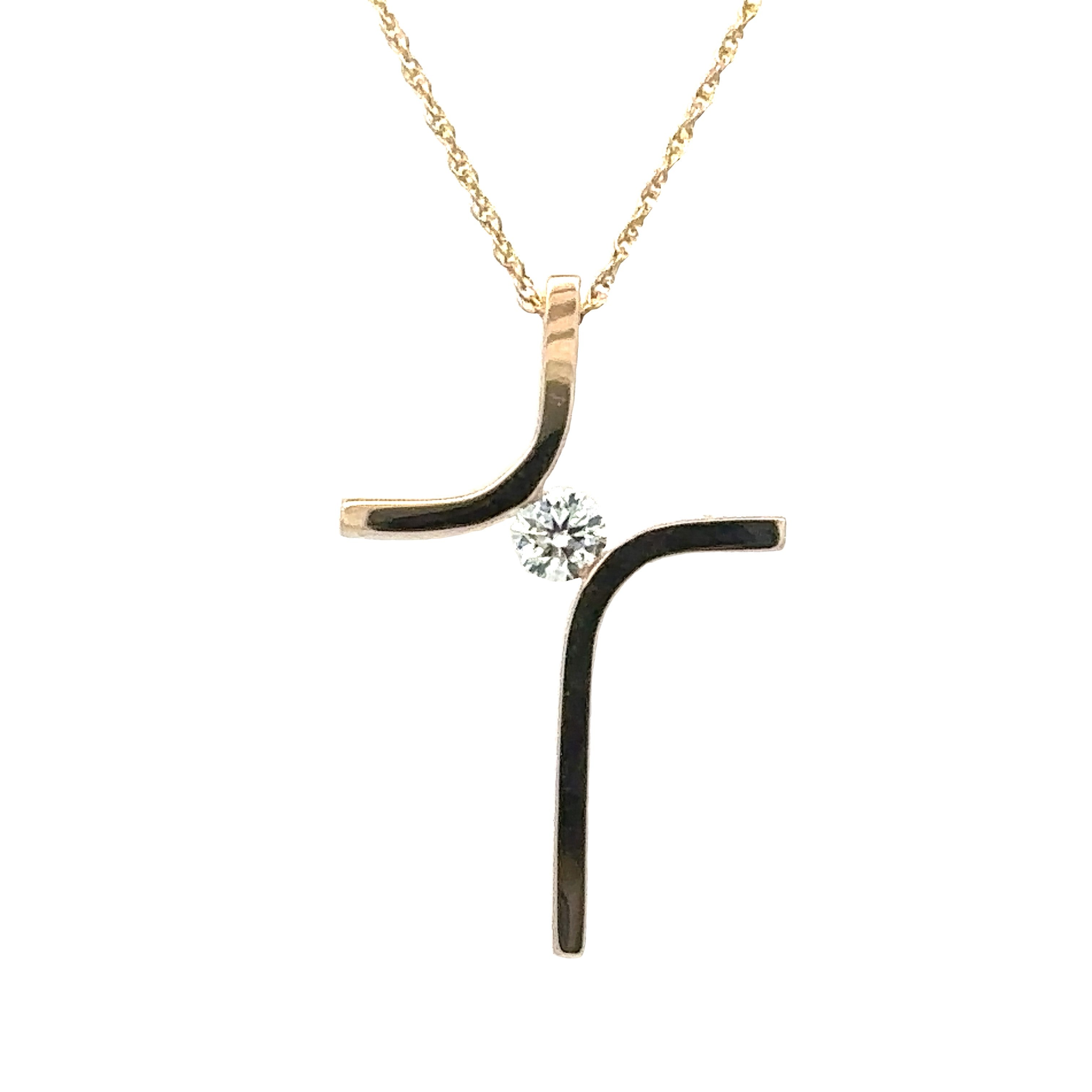 Lady's Yellow 14 Karat Cross Pendant With One 0.12Ct Round G/H Si1 Diamond