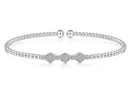 Lady's White 14 Karat Bujukan Bezel Fashion Bangle Bracelet Length 6 With 0.13Tw Round H/I Si2 Diamonds