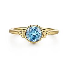 Lady's Yellow 14 Karat Bezel With Beaded Detail Fashion Ring Size 6.5 With One 1.02Ct Round Blue Topaz