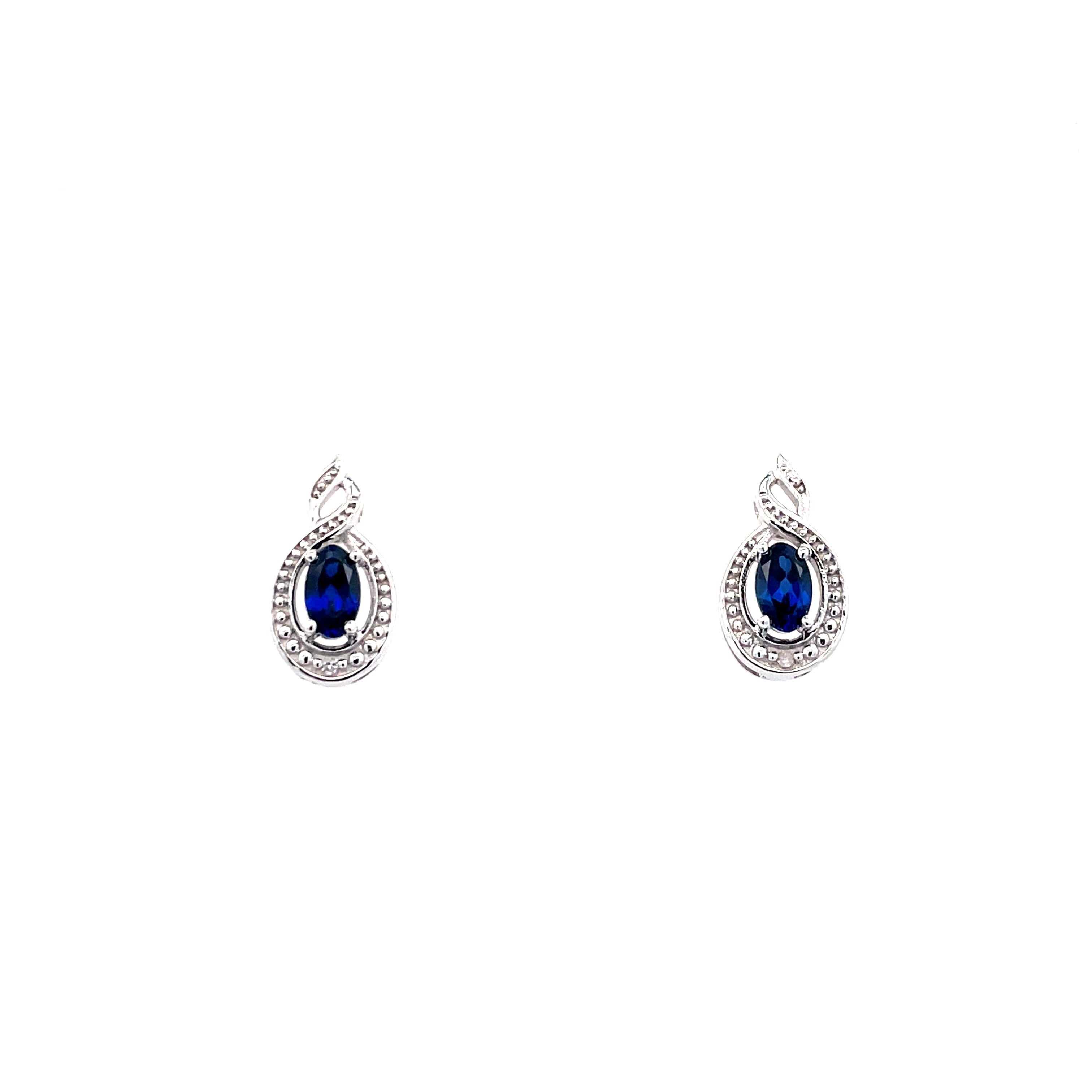 Lady's White Sterling Silver Rhodium Plated Twist Earrings With 2= Oval Created Sapphires And Round Diamonds Reg $150 Vendor Price $75 Purchases made from our Vendor Price case are not eligible for "complimentary" services. Standard ring sizings, setting
