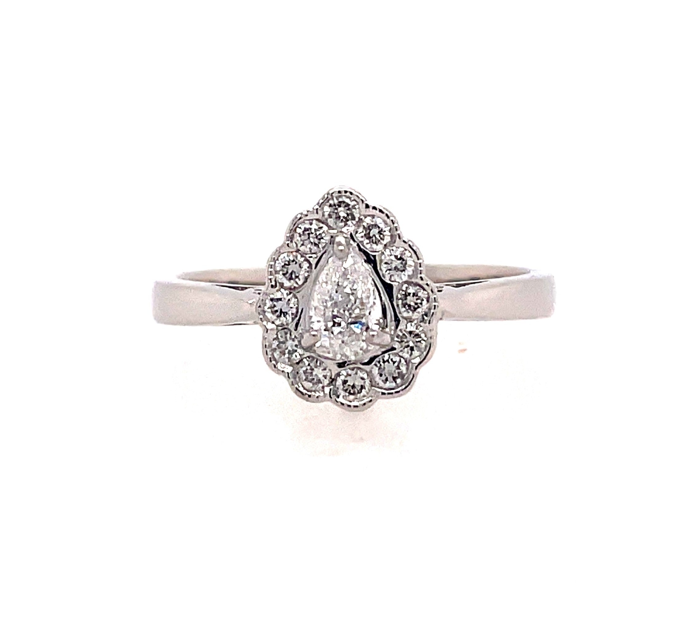 Lady's White Polished 14 Karat Pear Fashion Ring Ring With One 0.20Ct Pear G/H Si2 Diamond And 0.18Tw Round G/H Si2 Diamonds, Regularly $1800.00 Vendor Price $900.00

*Purchases made from our Vendor Price case are not eligible for "complimentary" servic
